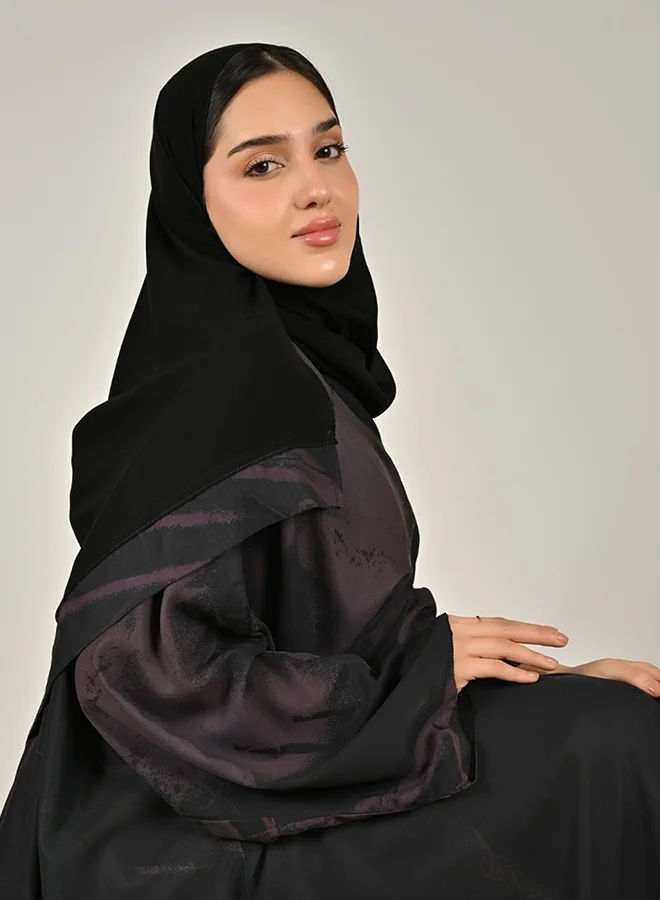 Hawraa Abaya Black and Purple Reversible Wrap Abaya with a Summer Design and Flowing Flared Silhouette