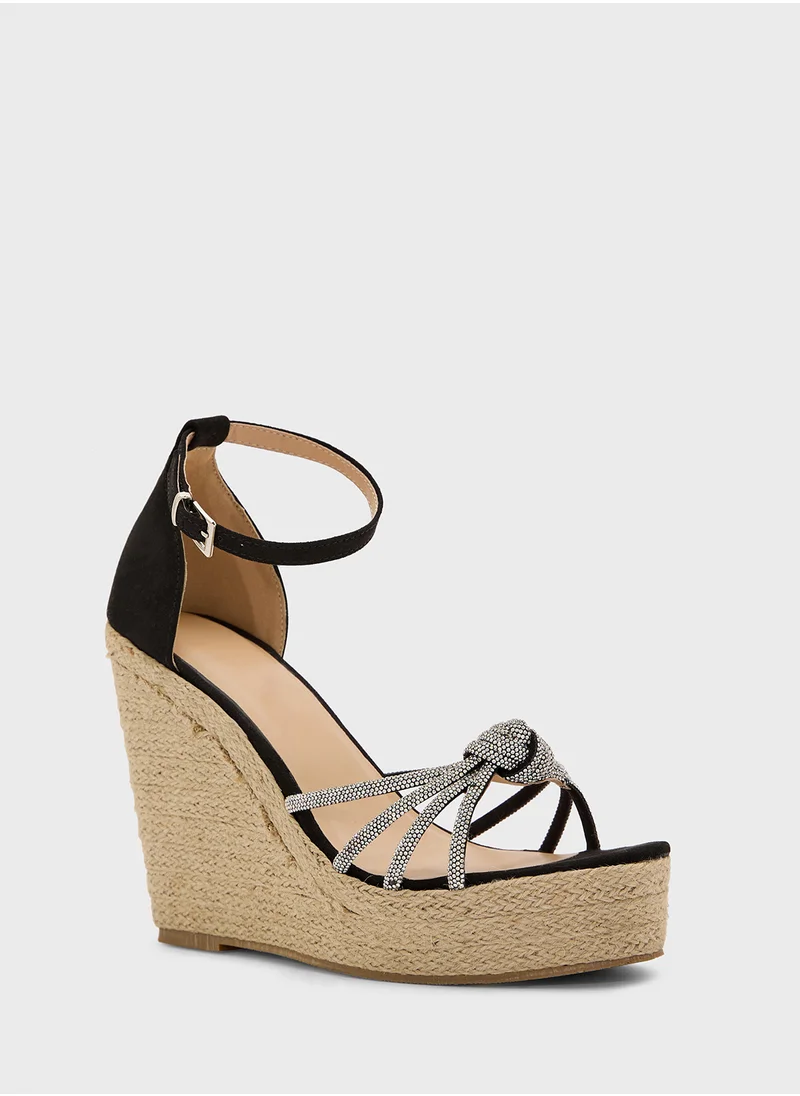 ترافل من نمشي High Heel Diamante Knot Wedge Sandal