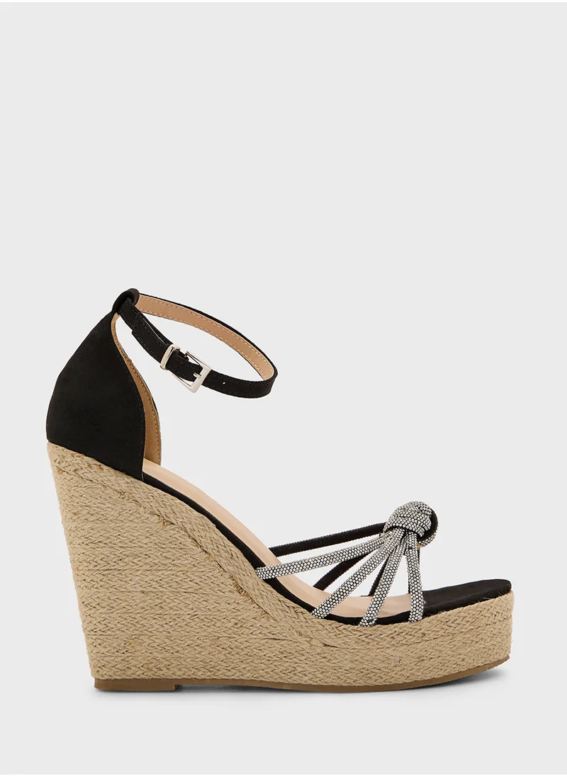 ترافل من نمشي High Heel Diamante Knot Wedge Sandal