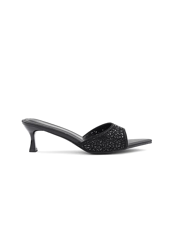 أيقون Heel slipper decorated with sparkling rhinestone accents.
