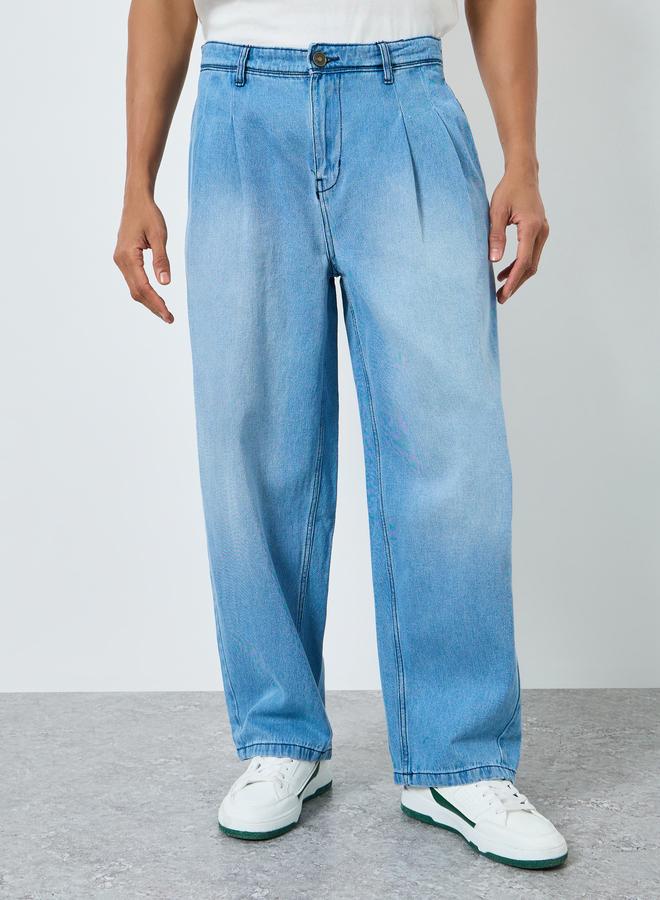 ستايلي جينز بأرجل واسع وتفاصيل مشطوفة - Image 1