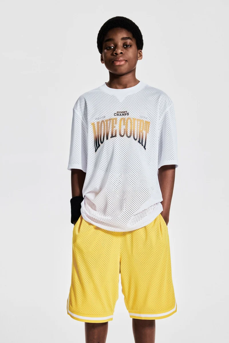 اتش اند ام بلوزة رياضية مطبوعة من نسيج دراي موف الشبكي