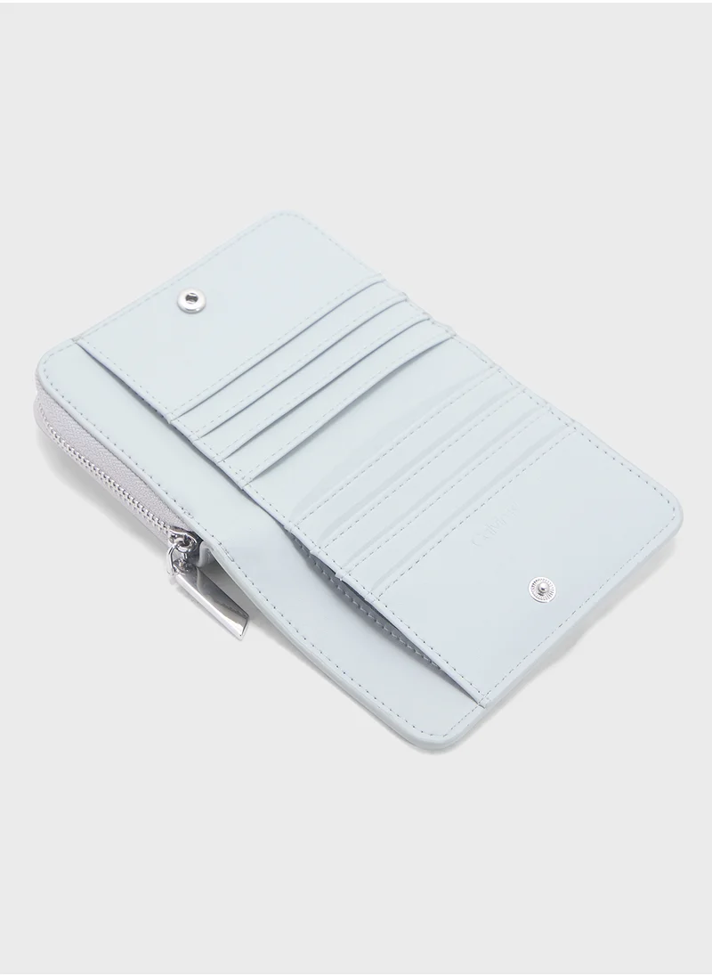CALVIN KLEIN MEDIUM ZIP WALLET