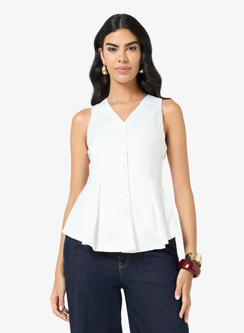 Peplum Sleeveless Blouse
