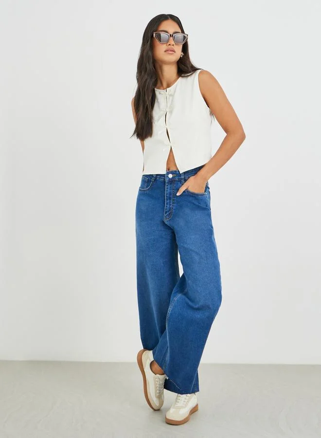 Styli Styli Bow Tie Front Slit Sleeveless Top