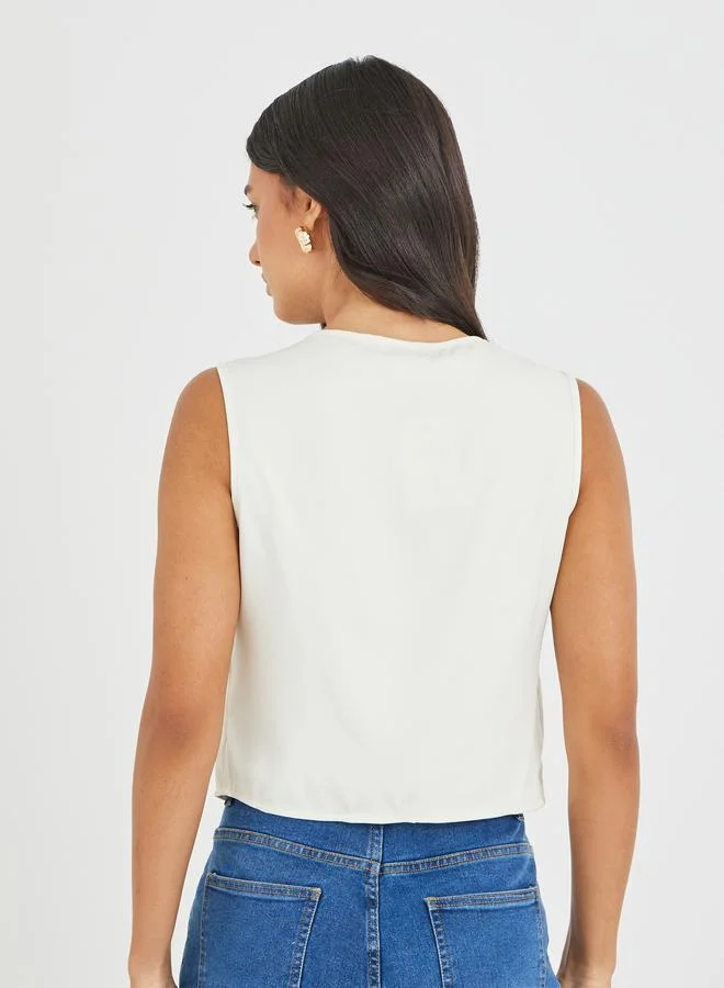 Styli Styli Bow Tie Front Slit Sleeveless Top
