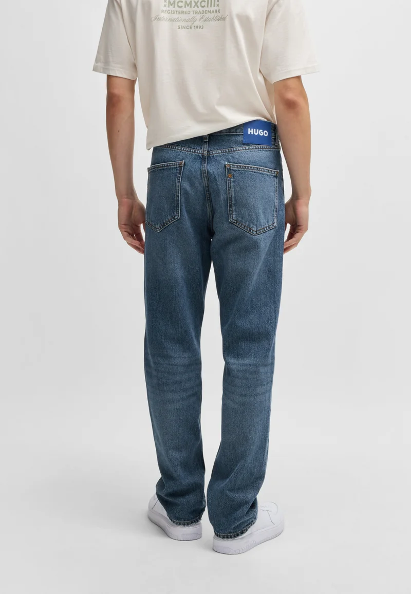 هوجو Regular-fit jeans in mid-blue stonewashed cotton denim