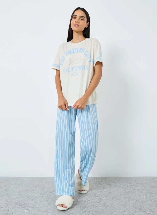 Styli Styli LA Graphic Stripe Sleeve T-Shirt and Striped Pyjama Set