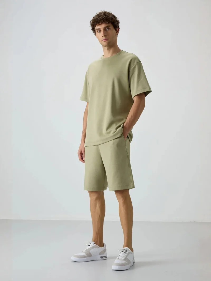 تومي لايف TOMMY Oversized T-Shirt And Shorts Set