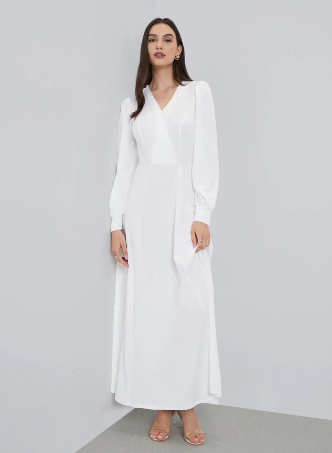 ستايلي فستان طويل بحافة واسعة وأكمام بالون