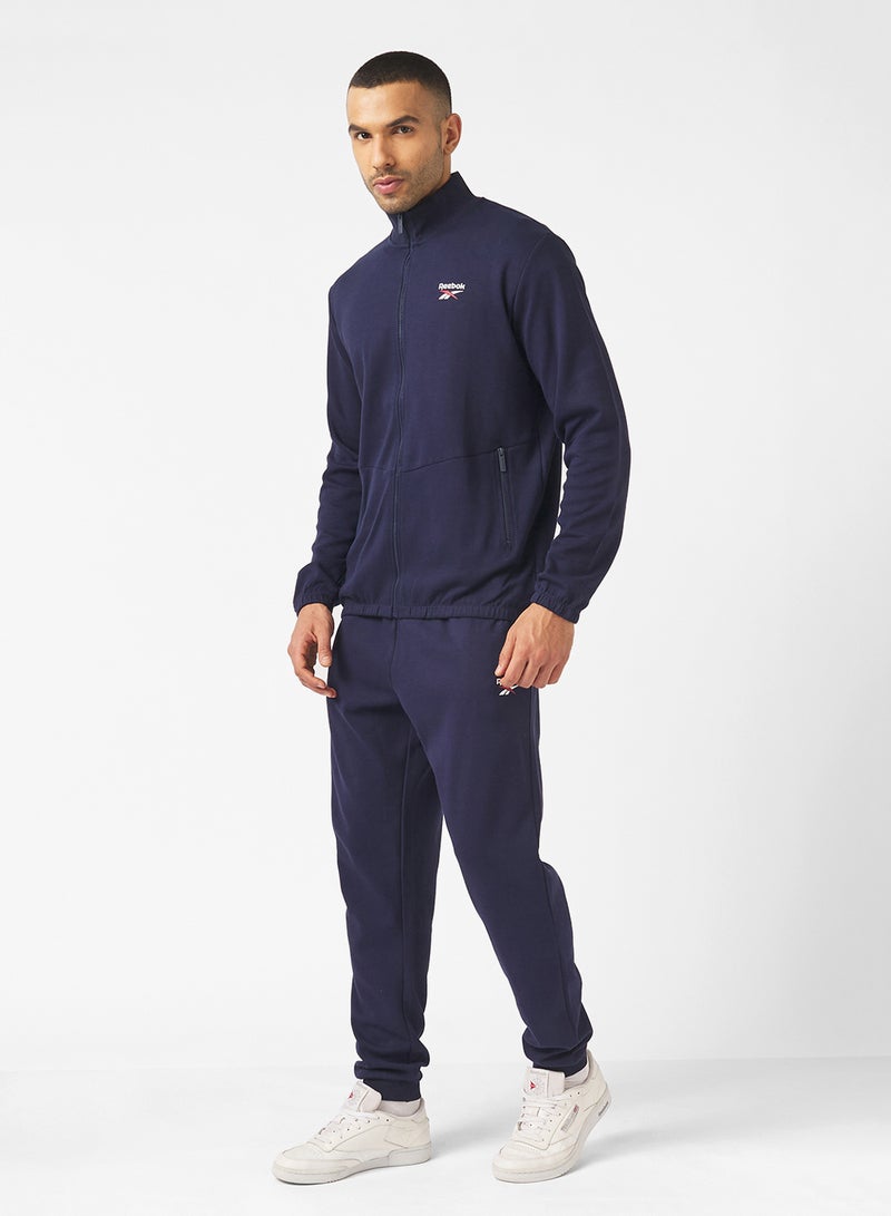 ريبوك بدلات رياضية بسحاب وشعار بنك - Image 1