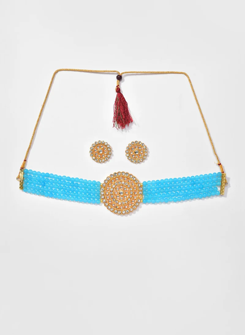 سوهي طقم مجوهرات صناعية مرصع بحجر أزرق فيروزي ومزين بالخرز