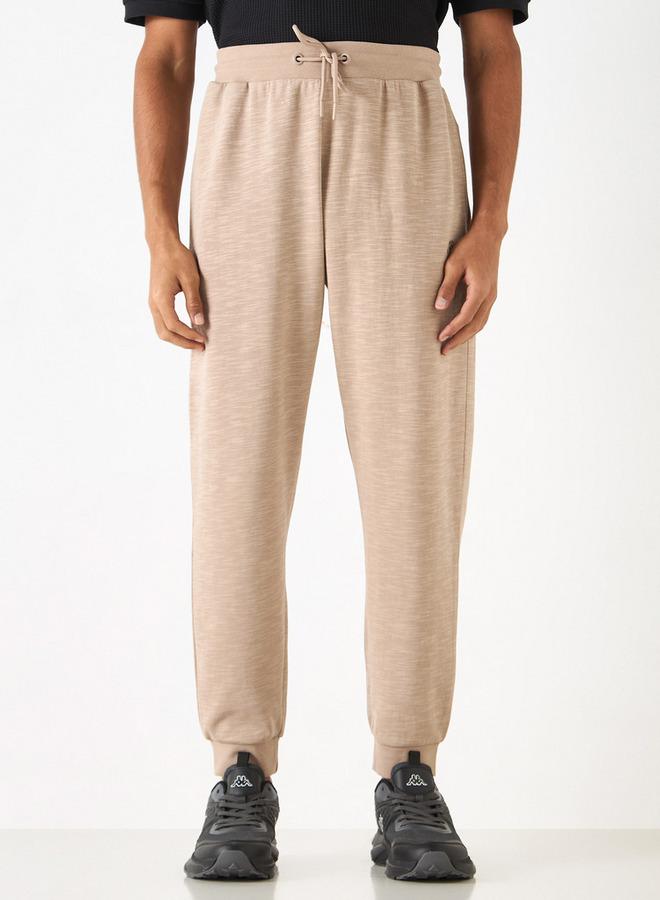 كابا بنطلون رياضي بتطريز شعار ورباط إغلاق وجيوب من كابا - Image 1