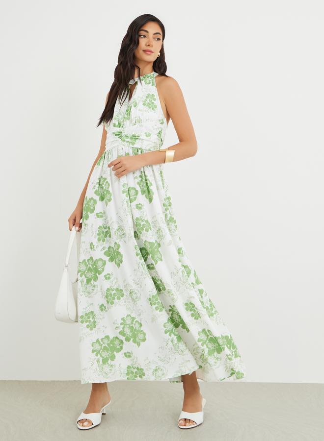 ستايلي فستان ماكسي بحمالات مطبوع بالزهور بتفاصيل فتحة مفتاح - Image 1