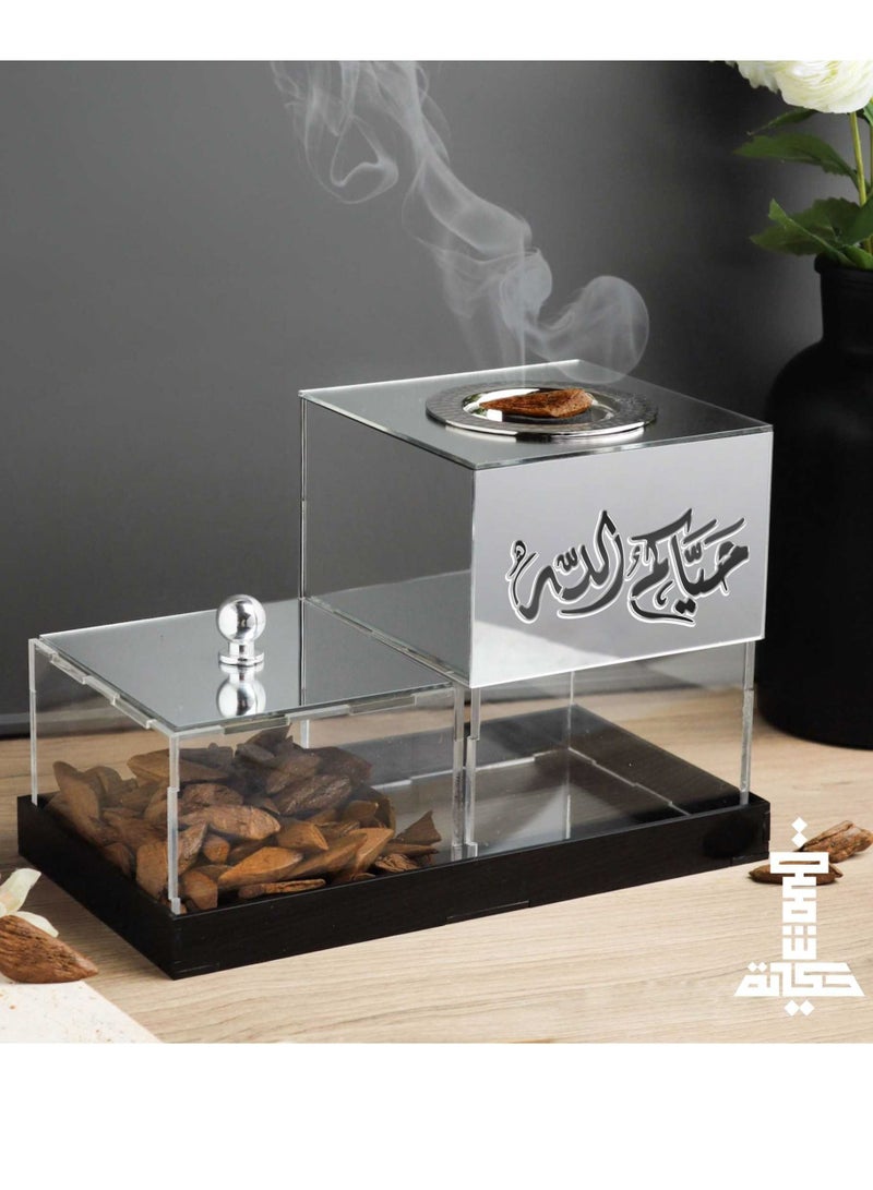 حكاية شمعة مبخرة فضي بعبارة حياكم الله  مبخرة مصنوعه من الاكريلك الشفاف والفضي