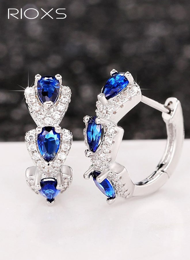 RIOXS Womens Rhinestone Hoop Earrings, Small Hoops Earrings 18K White Gold Plated Blue Cubic Zirconia Hinged Sleeper Tiny Hoop Earrings Trendy Jewelry for Prom Party Dating Anniversary - Image 2