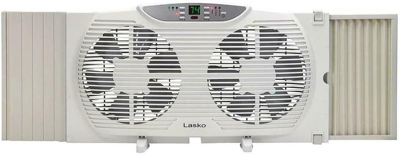 Lasko Electrically Reversible Twin Window Fan with Remote Control, W09550 - Image 1