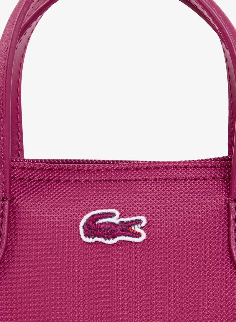 Lacoste  The iconic shopping crossover bag for Women | Best Price UAE