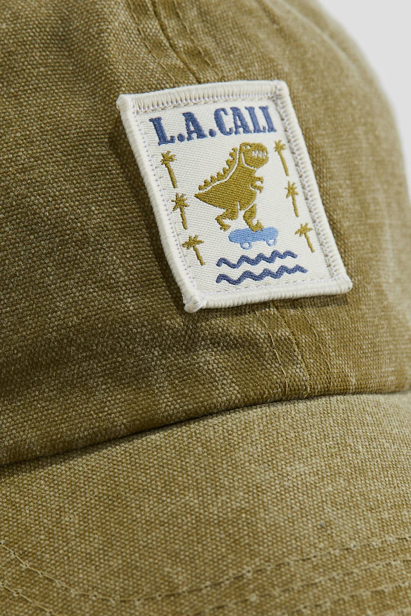 اتش اند ام قبعة من قطن التويل