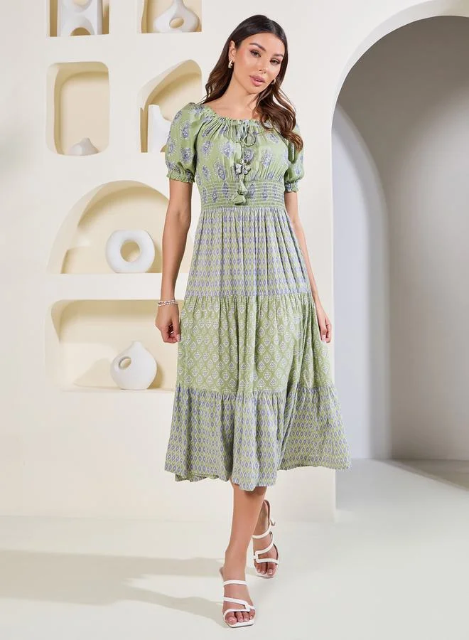 Styli Boho Print Smocked Detail Midi Dress with Tassel Detail