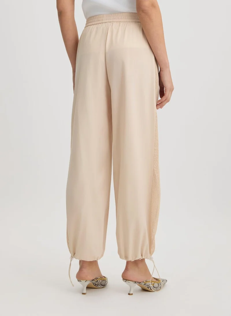 ليو جو بنطلون بيج برباط