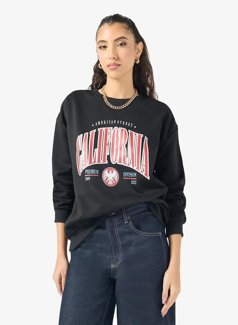 Ginger Oversize Varsity Graphic Sweatshirt