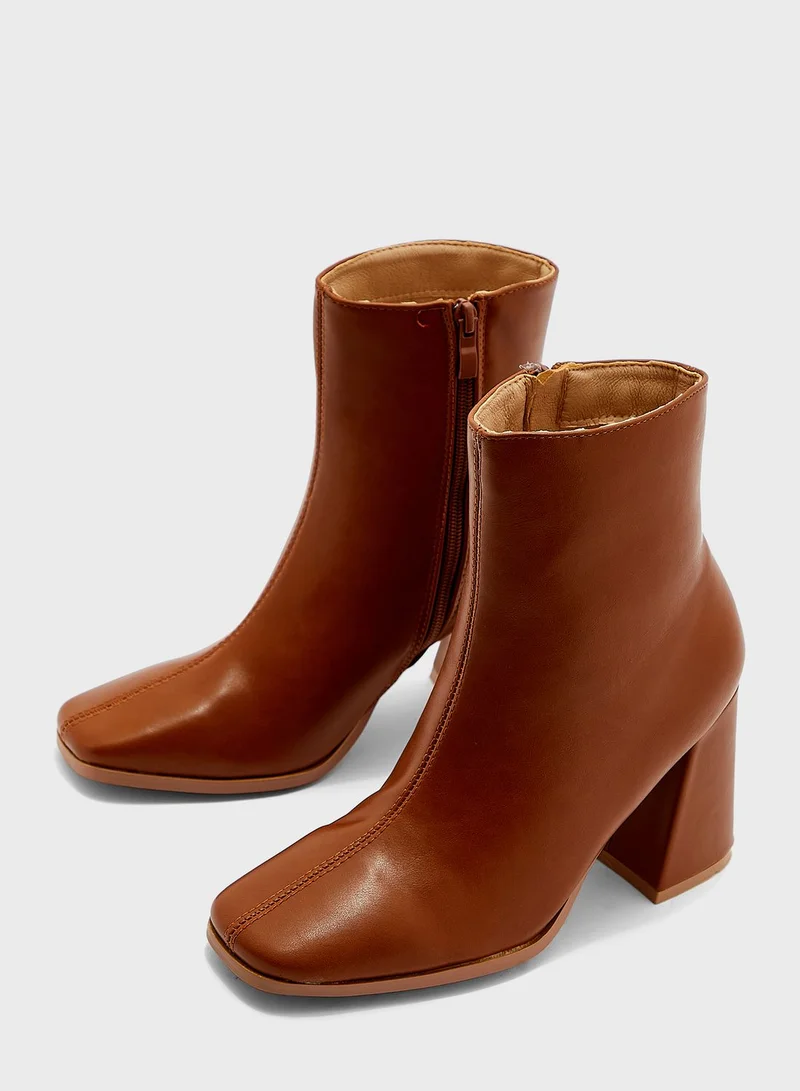Ginger Pointed Flared Heel Boot
