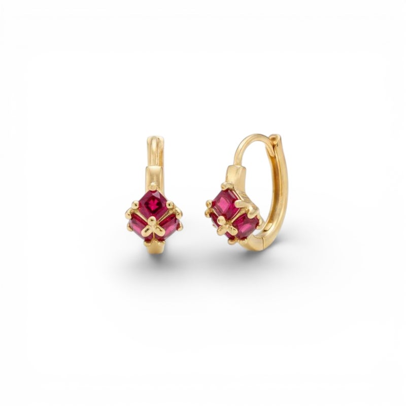 Gold earrings adorned with square ruby-red stones, featuring a striking geometric design reminiscent of a precious "gift." A piece that combines delicacy with bold color for a captivating look. - Image 1