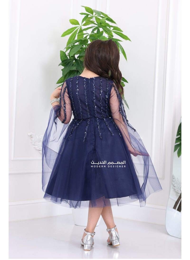 مودرن ديزاين فستان سهرة للأطفال فاخر مصنوع من خامة التل الفاخر، مع تطريز يدوي أنيق يضيف لمسة فخامة لا تقاوم صمم خصيصآ لطفلتك من براند المصمم الحديث - Image 2