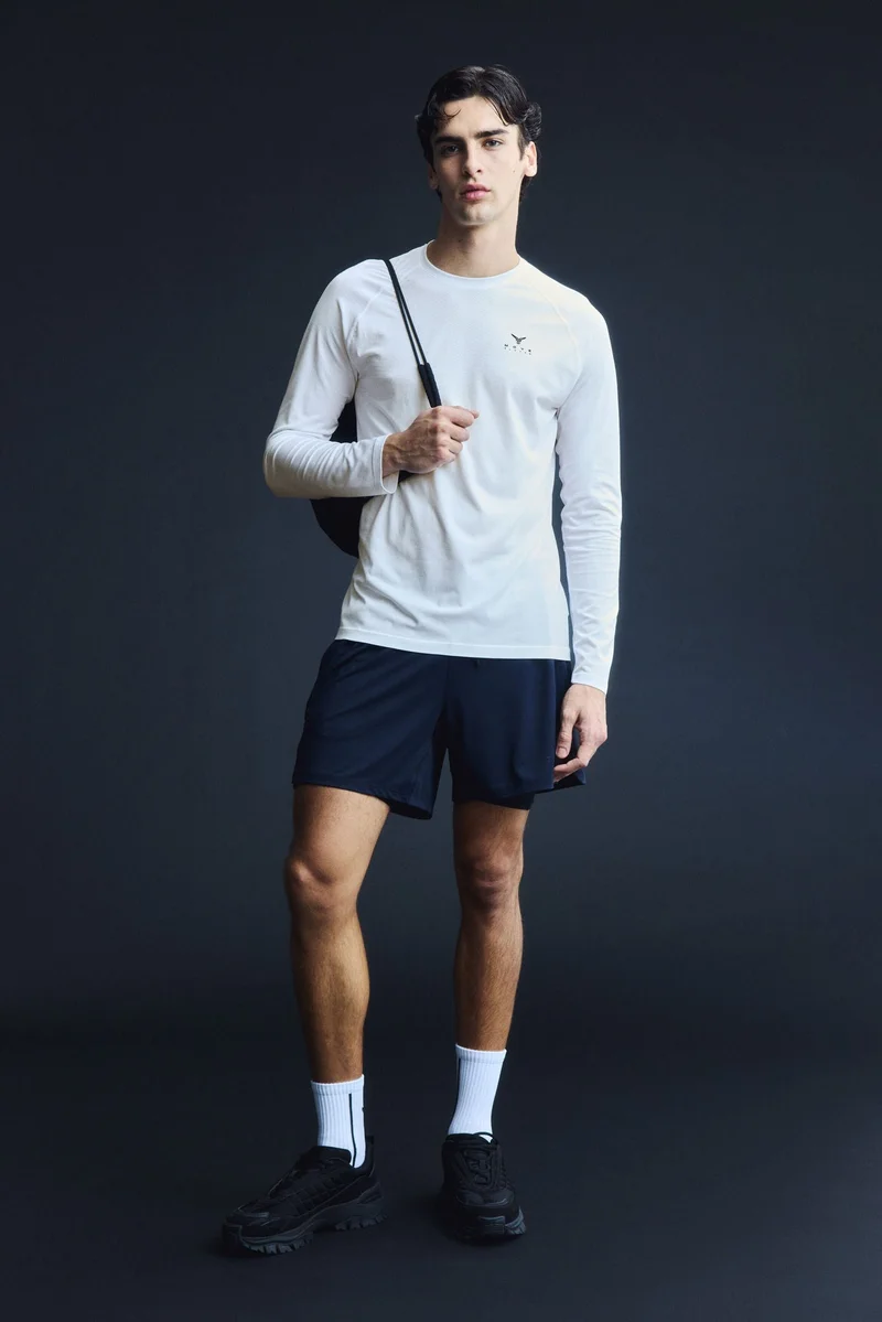 H&M  Muscle Fit Sports top with DryMove™ for Men | Best Price UAE