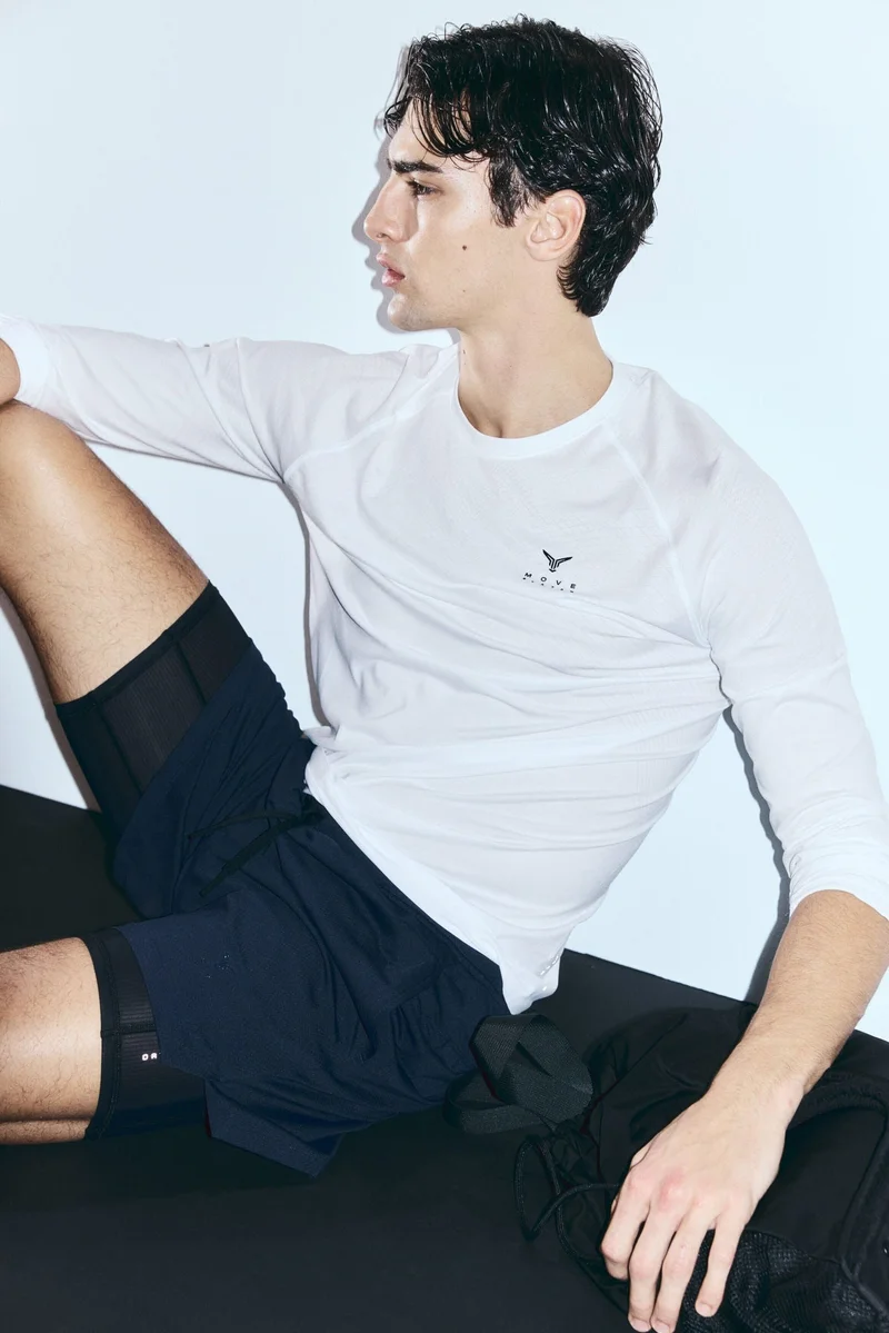 H&M  Muscle Fit Sports top with DryMove™ for Men | Best Price UAE
