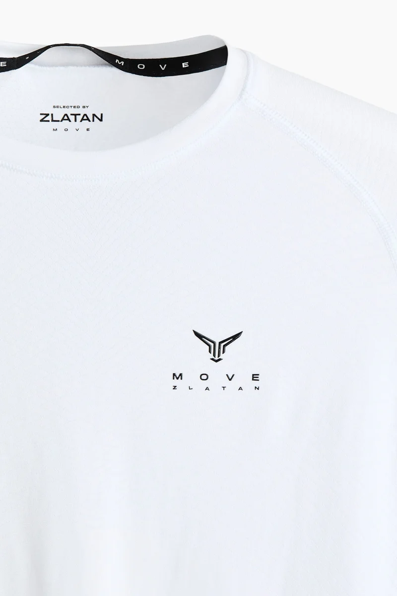 H&M  Muscle Fit Sports top with DryMove™ for Men | Best Price UAE