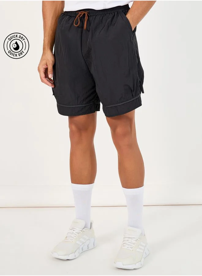 ستايلي 7inch Quick Dry Woven Shorts with Tape Hem & Zip Detail