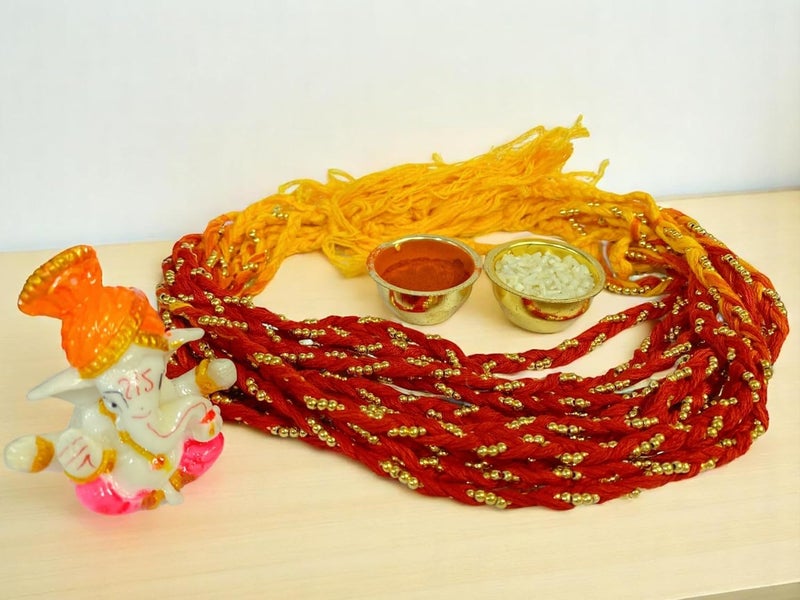 Evisha 12 Pcs Simple Elegant Moli Thread Rakhi with Ganesh Murti for Brother Rakhi for Bhaiya with Roli Chawal Packet - Image 2