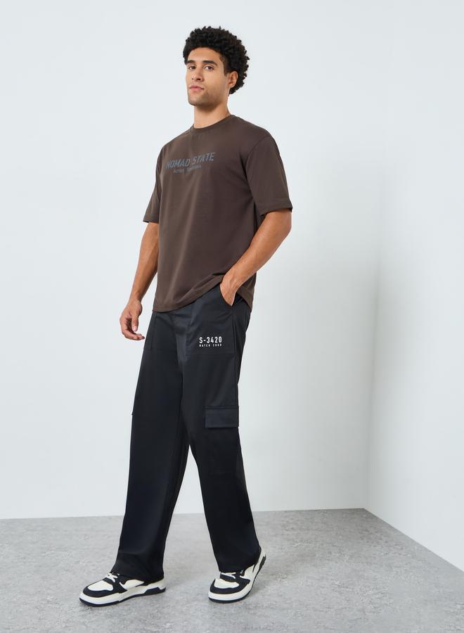 ستايلي تيشيرت بمقاس كبير بطبعة جرافيك - Image 2