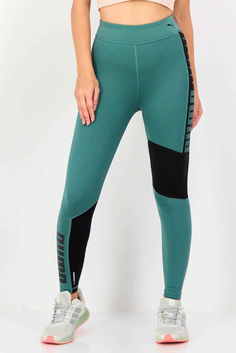 PUMA Women Sportswear Fit Training Leggings, Teal Green - Image 1