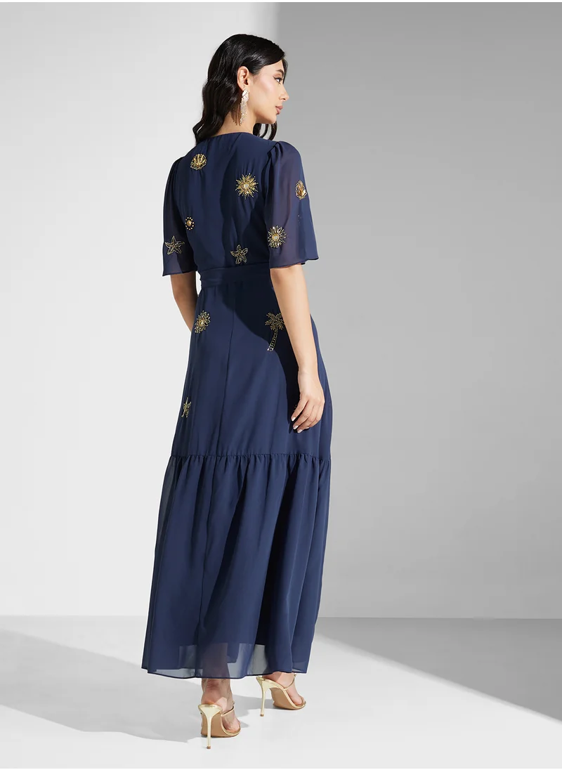 Hope & Ivy Embellished Maxi Wrap Dress With Flutter Sleeve