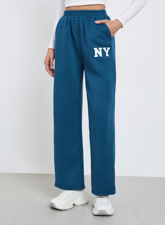 ستايلي جوغر بأرجل واسعة وطبعة كتابة - Image 2