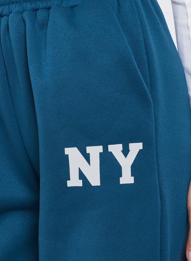 ستايلي جوغر بأرجل واسعة وطبعة كتابة - Image 3