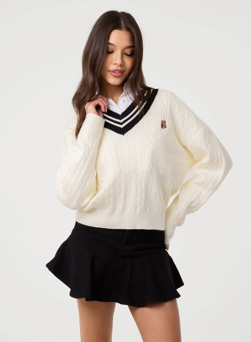 بينك فانيلا كنزة صوف محبوكة بياقة على شكل حرف