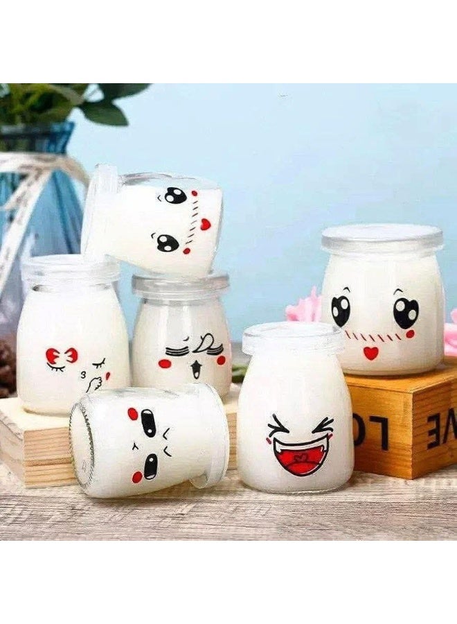Add fun and organization to your kitchen with this 10-piece imported Emotion Glass Jar Set (100ml each) featuring cute emoji designs. Equipped with airtight plastic lids, these versatile jars are perfect for baby meals, yogurt, pudding, or jams, ensuring safe, leak-proof travel, and are fully microwave and dishwasher safe. - Image 2