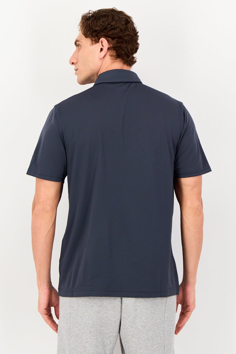 UNDER ARMOUR قميص بولو قصير الأكمام للرجال بتصميم فضفاض، رمادي داكن - Image 3