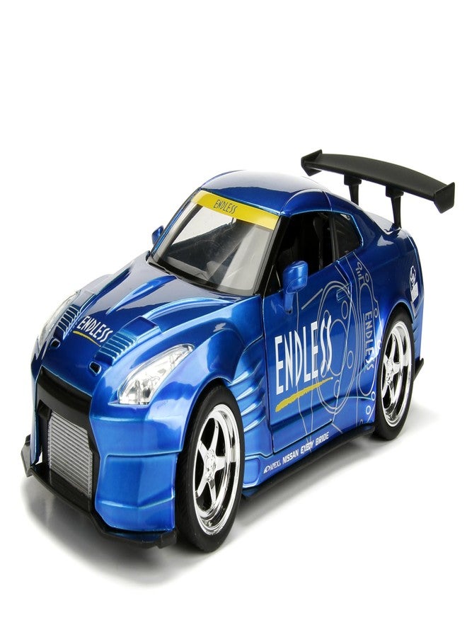 Jada Toys JDM Tuners 1:24 2009 Nissan GT-R R35 Ben Sopra Die-cast Car - Opening Doors, Hood, Trunk, Rubber Tires - Image 1