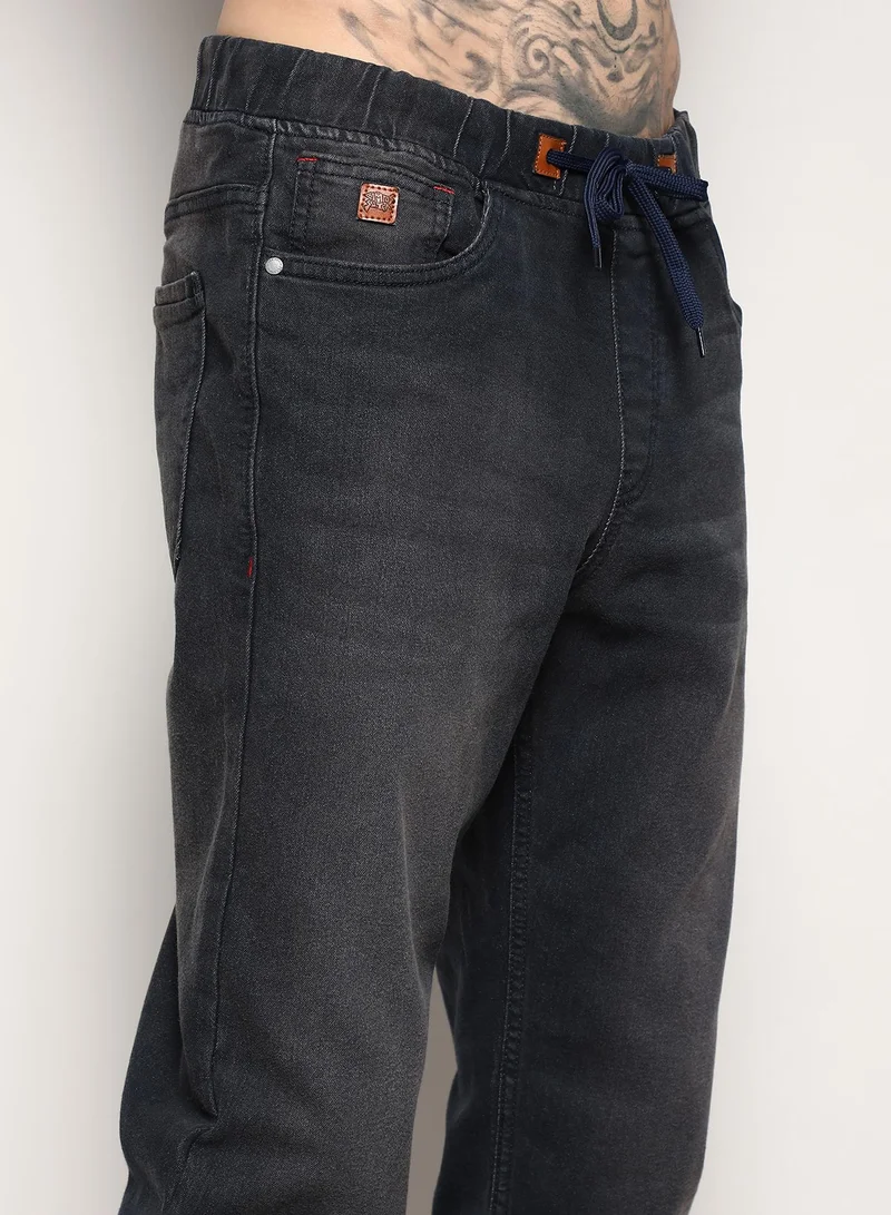 Campus Sutra Men's Dark Grey Cinched Hem Denim Jeans