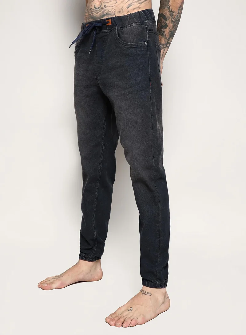 Campus Sutra Men's Dark Grey Cinched Hem Denim Jeans