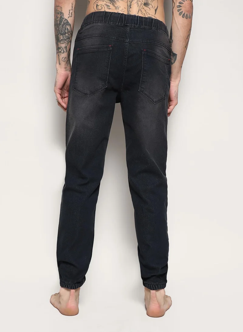 Campus Sutra Men's Dark Grey Cinched Hem Denim Jeans