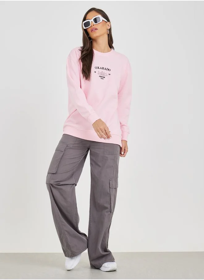 ستايلي Regular Fit Longline Embroidered Slogan Sweatshirt