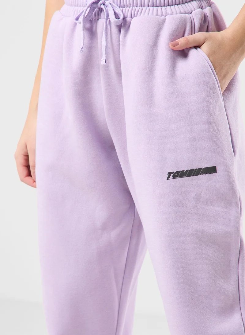 The Giving Movement Oversized Racer Printed Joggers