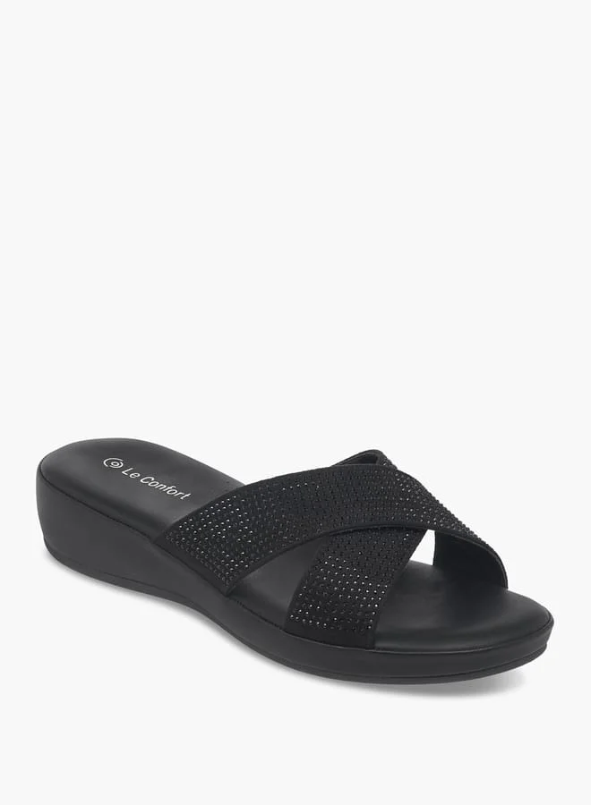 لو كونفورت صنادل نسائية بشعار مطبوع وحزام متقاطع سهلة الارتداء