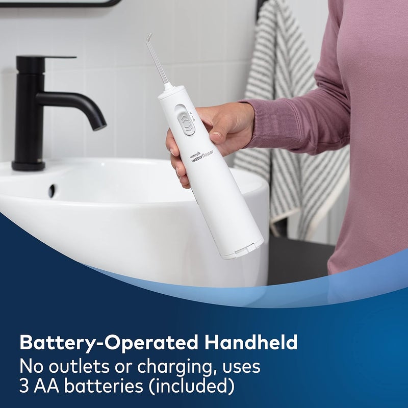 Waterpik جهاز تنظيف الأسنان بالماء اللاسلكي ووتربك إكسبريس يعمل بالبطارية محمول للسفر والمنزل معتمد من ADA مقاوم للماء للاستخدام في الدش أبيض WF02 قد يختلف التعبئة - Image 3